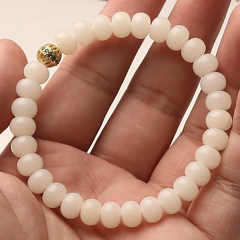 Vòng tay bồ đề Bạch Ngọc – hạt tròn phối hạt vàng (VB07) – ảnh 2