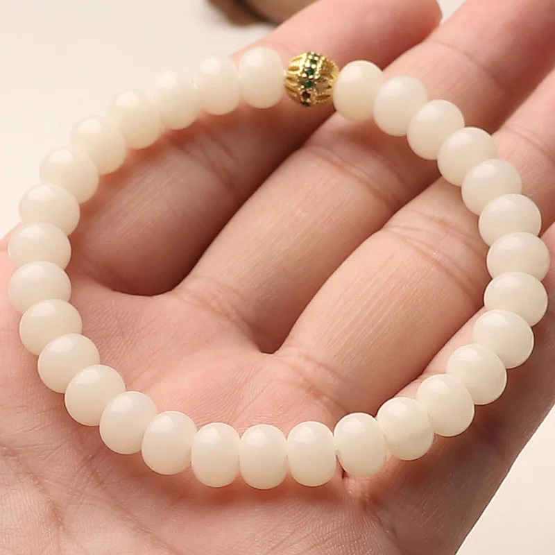Vòng tay bồ đề Bạch Ngọc – hạt tròn phối hạt vàng (VB07) – ảnh 4